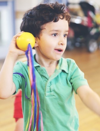 1508 Boy with ribbon ball