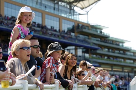 Family Enjoying Racing