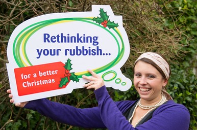 Suzanne holding rethinking your rubbish sign